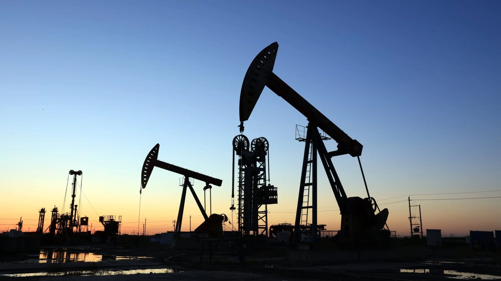 Oil prices tumble 4% on weak demand and higher crude output from OPEC members